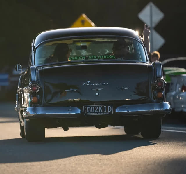 VMECH-backed Pontiac cruising at golden hour